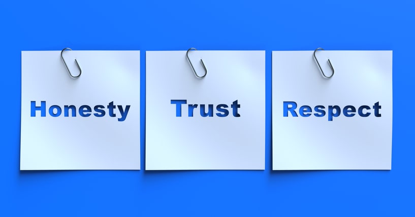 post it notes that read Honesty, Trust, Respect on blue background