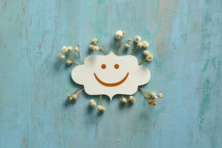 illustration of a smile face and popcorn surrounding